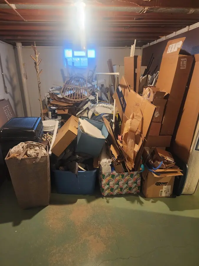 Roll-off dumpster container at job site for 4 Yard Dumpster Rental in Logan